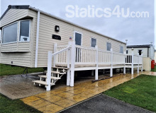 3 BEDROOM 8 BERTH CARAVAN with D.G. C.H. DECKING & PATIO FURNITURE