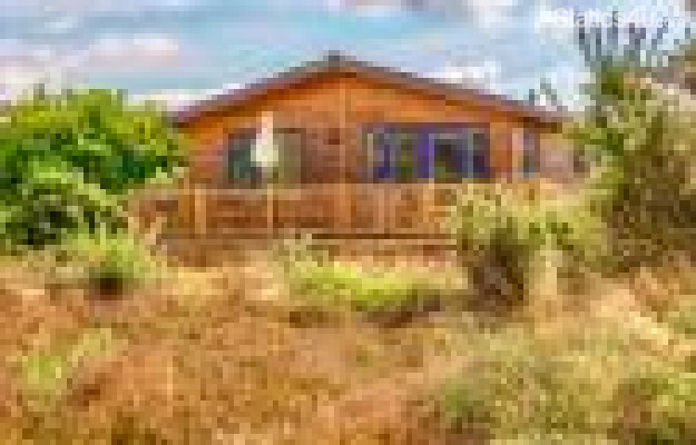 Front view. Lodge in private area known as Heathlands, very best available on site. Quiet location, only 5 mins walk to all facilities and on 300 acre as of footpaths seconds away. Front view. Lodge in private area known as Heathlands, very best available on site. Quiet location, only 5 mins walk to all facilities and on 300 acre as of footpaths seconds away.