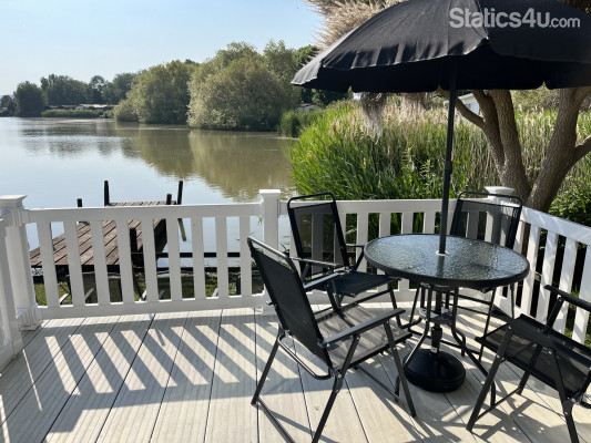 Enjoy your meals on our veranda by the lake Enjoy your meals on our veranda by the lake
