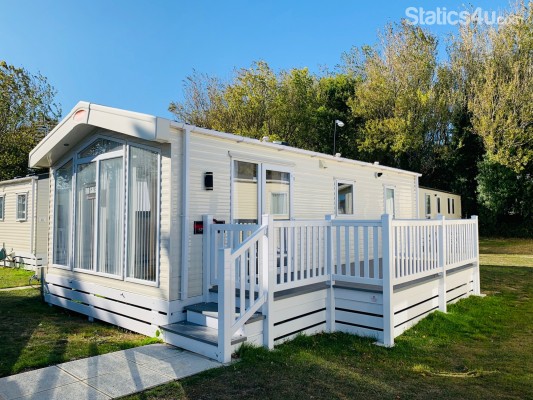 Outside with Side Decking and Skirting Included Outside with Side Decking and Skirting Included
